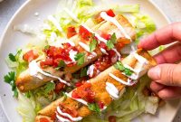 Crispy Chicken Taquitos with Avocado Crema