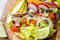 Grilled Chicken Tacos with Avocado and Cotija Slaw
