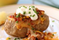 Turkey Chili Stuffed Baked Potato with Cheddar
