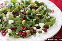 Arugula Salad with Pomegranate Seeds, Blue Cheese and Pistachios