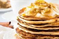 Fluffy Banana Walnut Pancakes with Maple Syrup