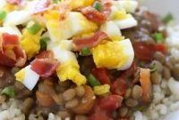 Skillet Lentils and Rice with Fried Eggs and Crispy Bacon