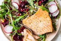 Salmon Salad with Beets, Arugula, Pistachios and Pomegranate
