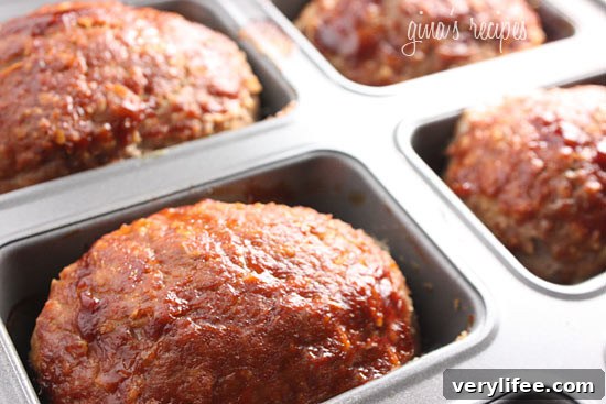 Petite turkey meatloaves baked in a small loaf pan.