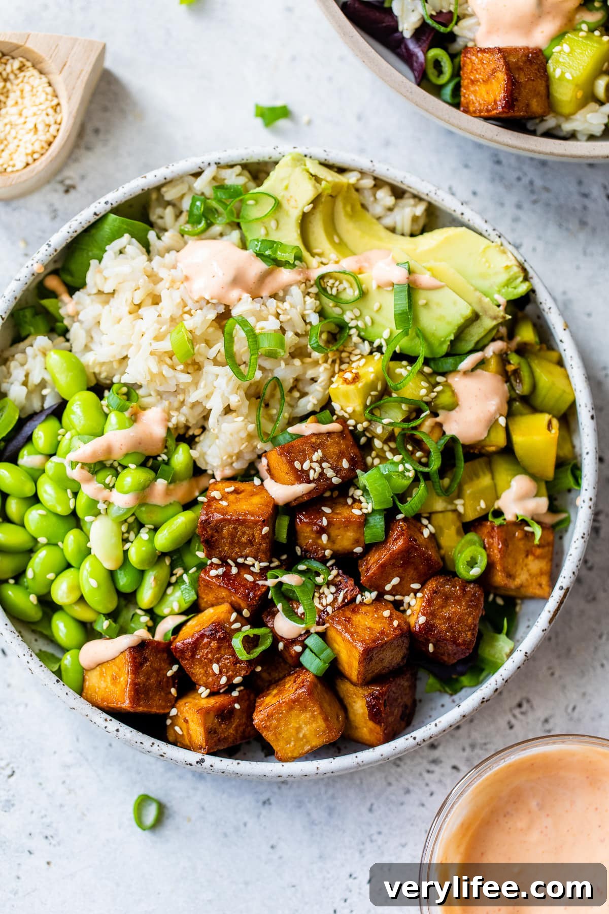 Tofu Poke Bowl Recipe with Mango and Avocado 6 Tofu Bowls with rice, avocado and edamame