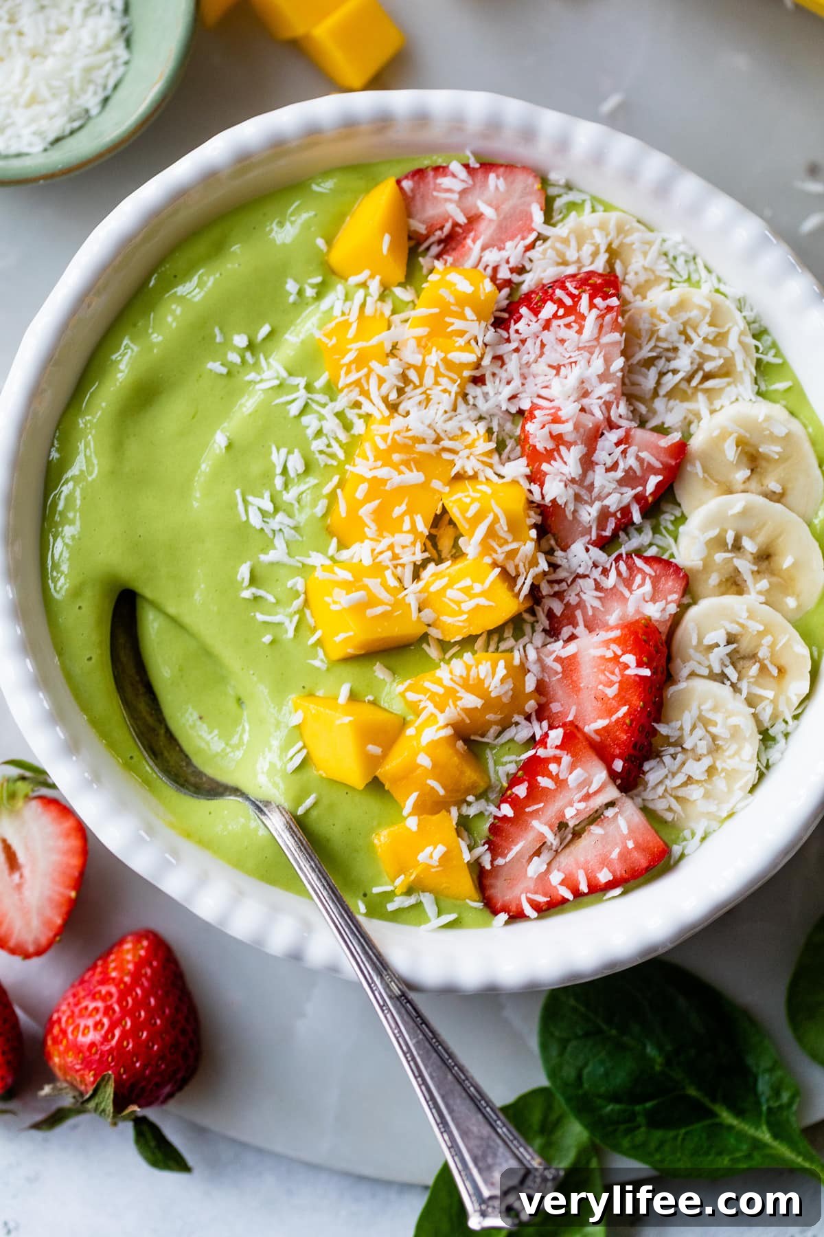 Creamy Green Smoothie Bowl Recipe with Spinach and Avocado 3 Smoothie Bowl with spinach, mango, strawberries and banana