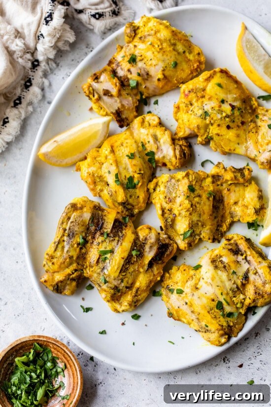 Platter of grilled chicken thighs
