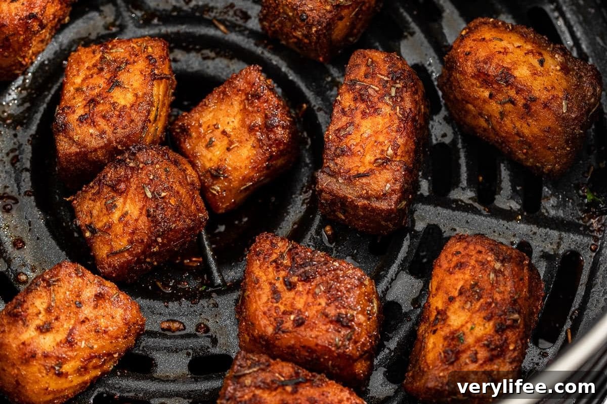 Top 4 Air Fryers for 2024: Reviews and Buying Guide 9 Recipe developer cooking with an air fryer