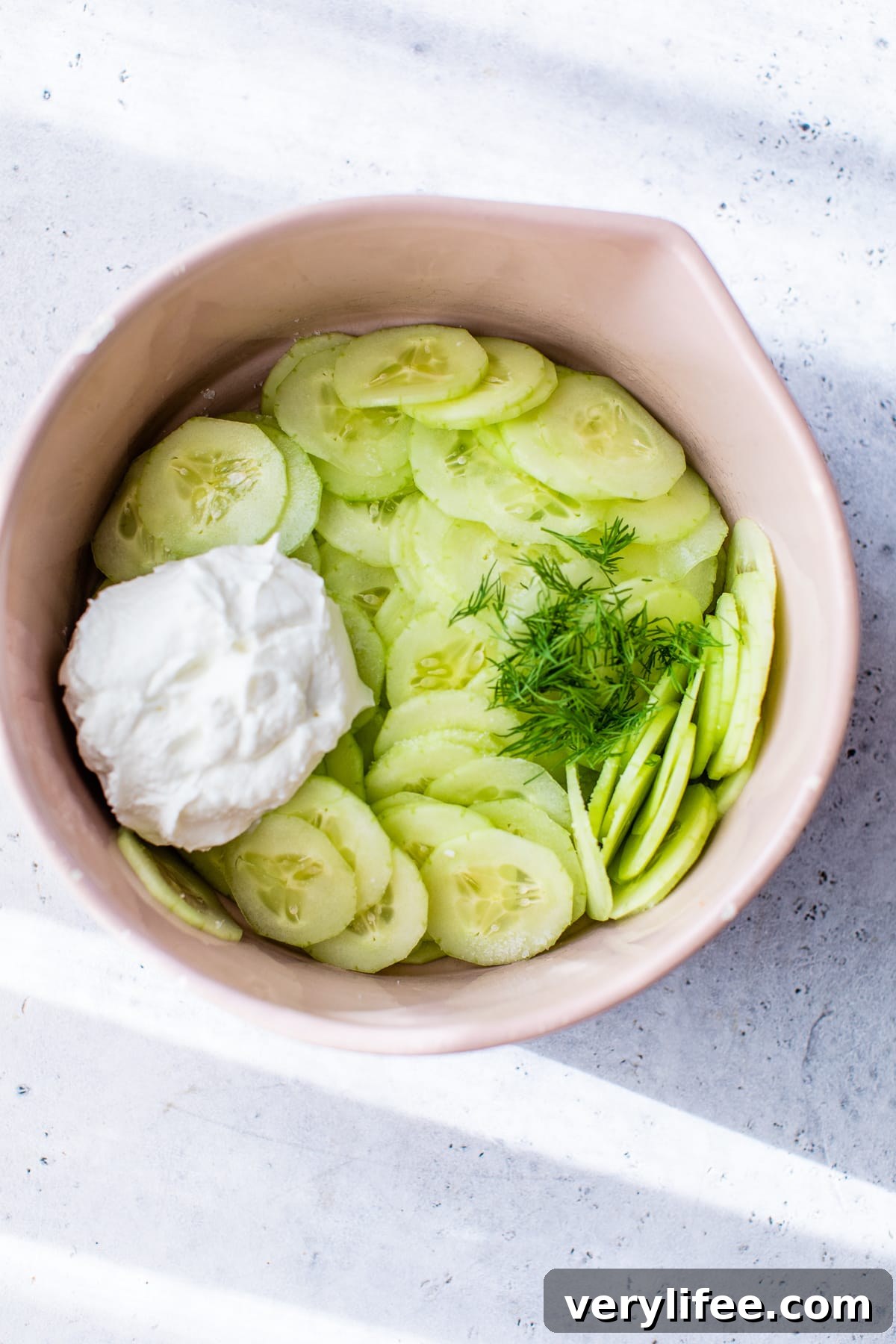 Creamy Cucumber Salad with Dill and Yogurt Dressing 4 sliced cucumbers with yogurt