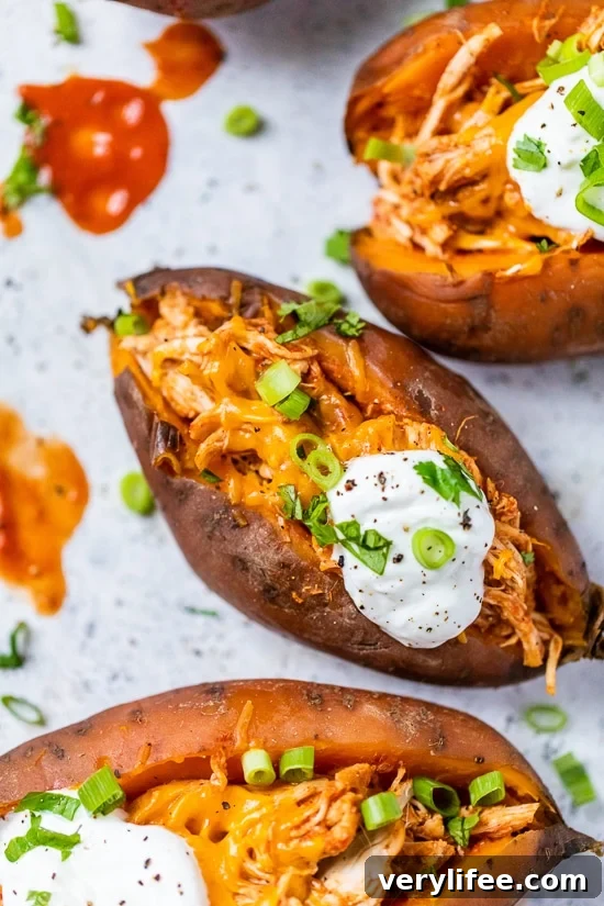23 Crock Pot Chicken Recipes for Quick Weeknight Dinners 16 Slow Cooker Chicken Enchilada Stuffed Sweet Potatoes