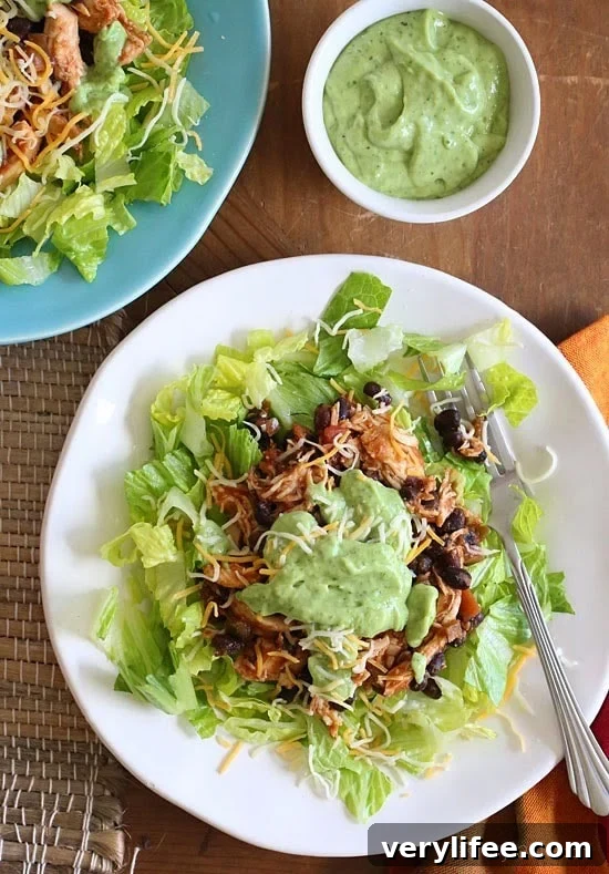 23 Crock Pot Chicken Recipes for Quick Weeknight Dinners 18 This simple slow cooker chicken taco salad is high in fiber and protein which means it's very satisfying – all for under 300 calories. Trust me, you won't miss the tortillas!