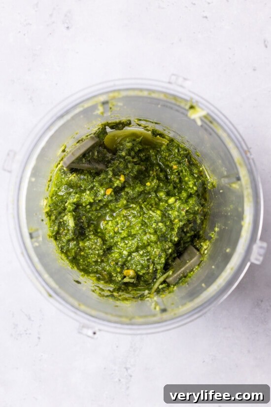 Spring Pesto Pasta with Asparagus, Peas, Arugula and Pistachios 4 Make the basil pesto.