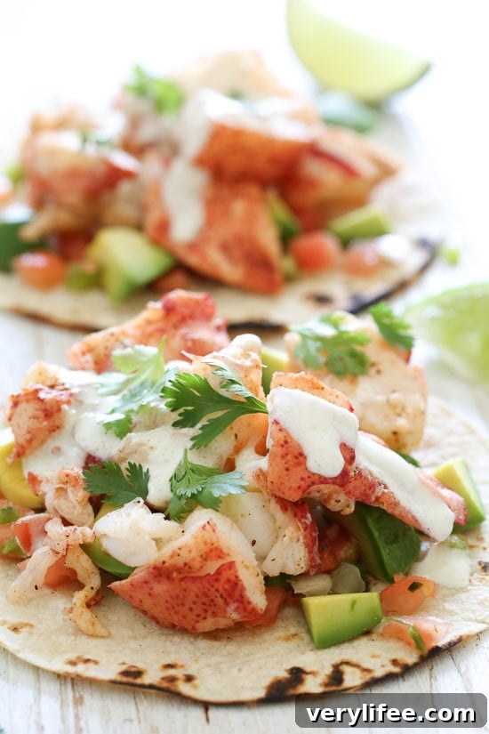 These lobster tacos are made with steamed chunks of lobster meat, avocado and pico de gallo, topped with a spicy poblano crema. If you want to step up your fish taco game, you need these in your life!