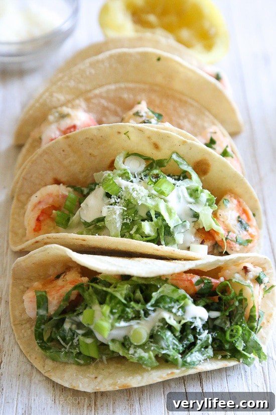 Shrimp Scampi Tacos with Caesar Salad Slaw, a unique twist on a shrimp taco and ready in under 20 minutes!