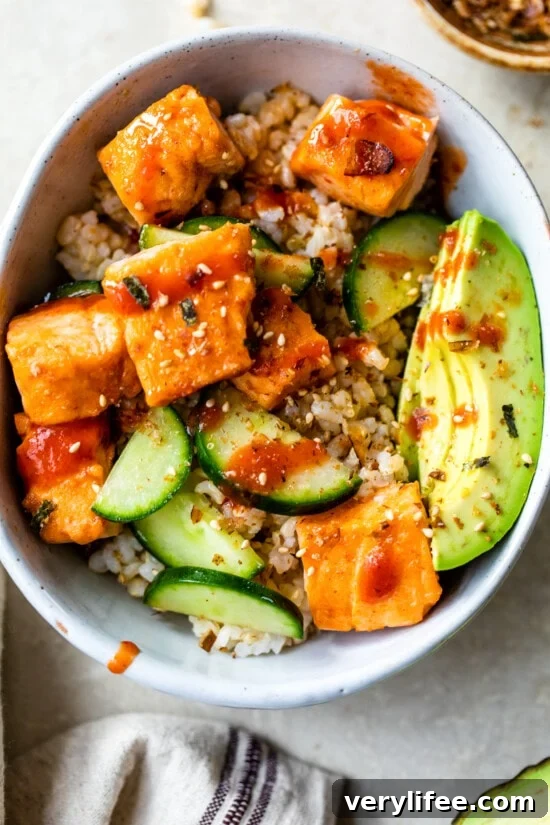 Roasted Salmon Rice Bowls with avocado and cucumber