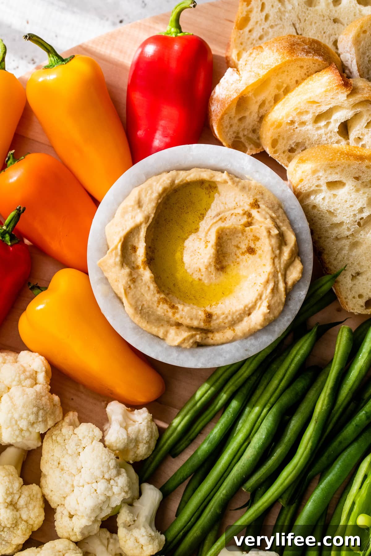 Veggie Tray Ideas for Parties with Dips 5 hummus and veggies on board