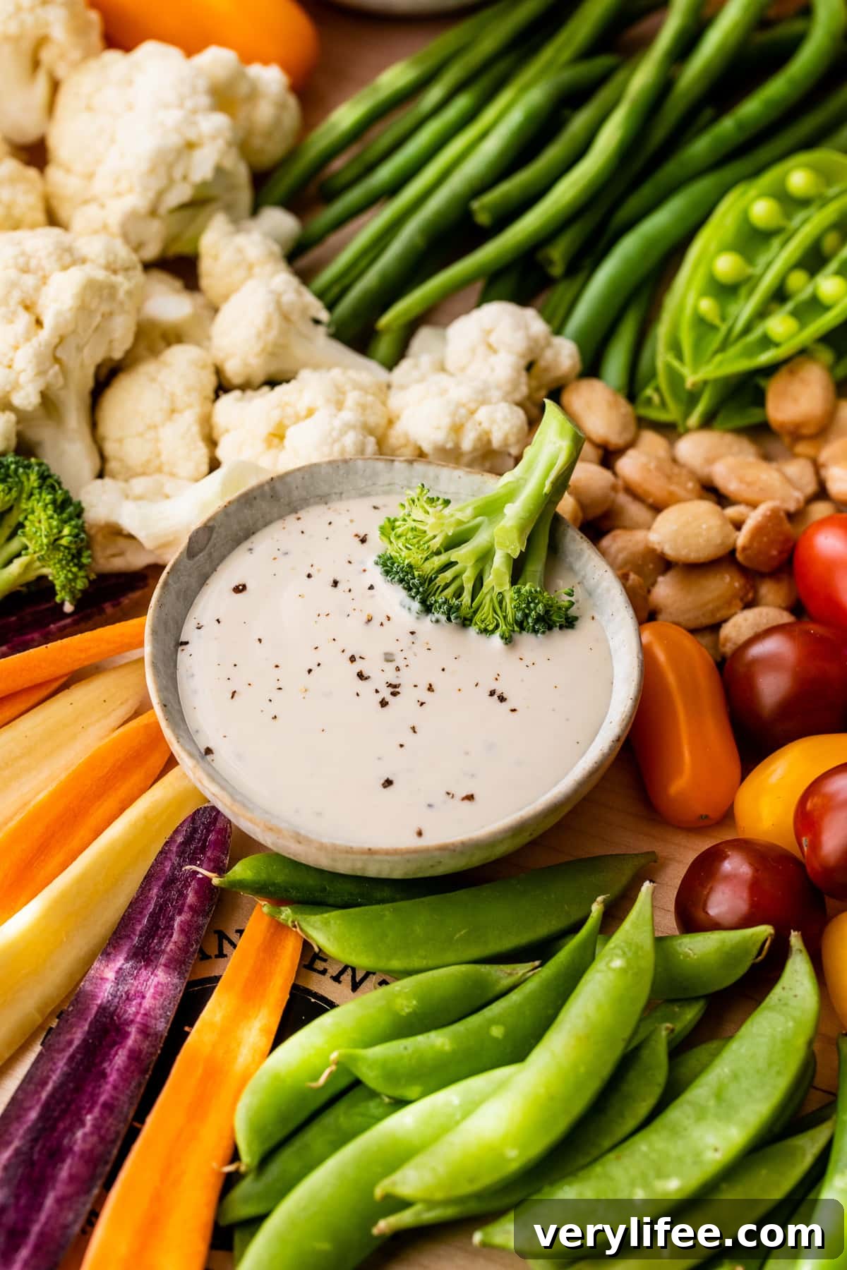Veggie Tray Ideas for Parties with Dips 6 Broccoli floret in bowl of dip