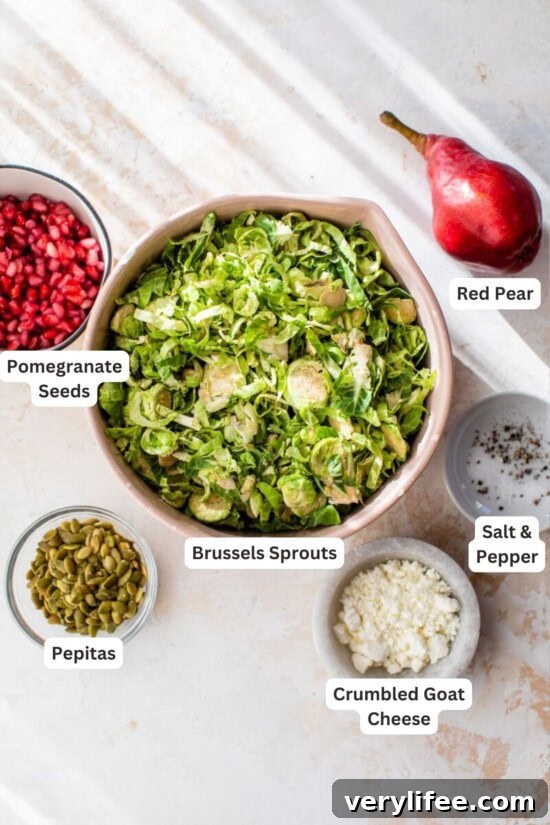 Ingredients for Shaved Brussels Sprout Salad with Pears and Pomegranate.