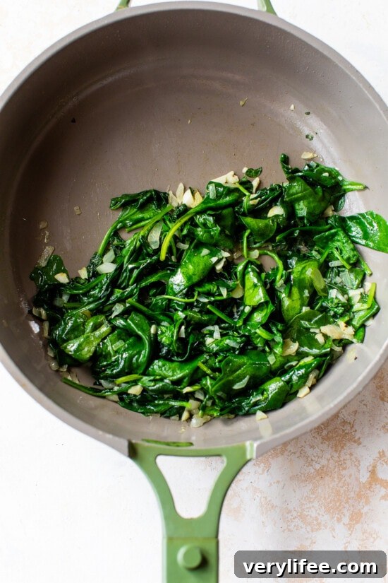 Creamy Spinach and Artichoke Crostini 5 sauteed spinach