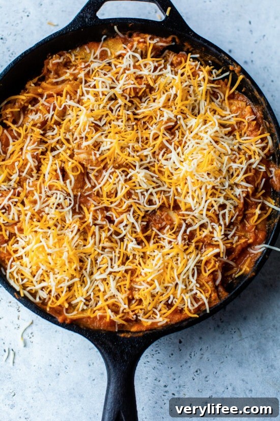 Skillet Enchiladas with Leftover Turkey 6 skillet with enchiladas and cheese