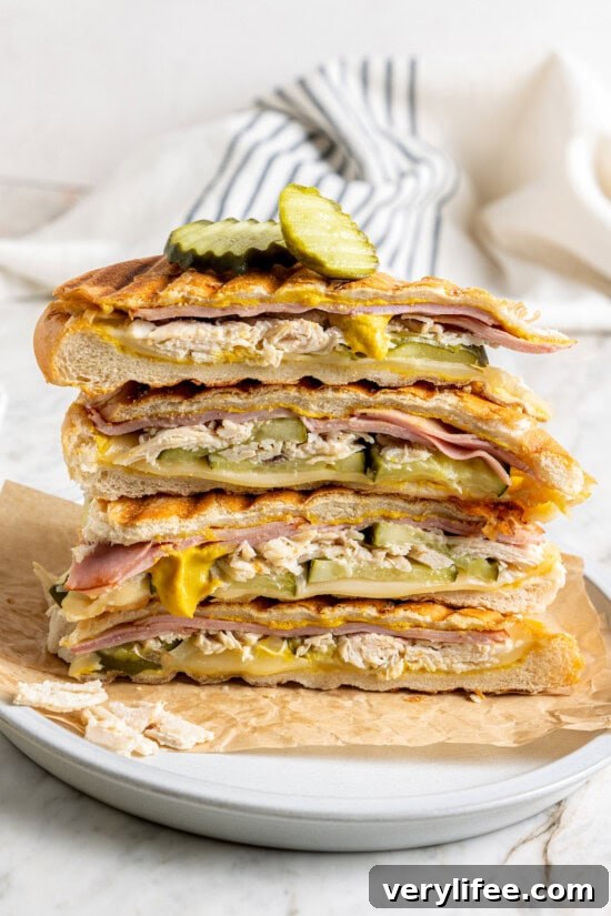 20 Creative Thanksgiving Leftover Recipes to Transform Your Meal 4 Stack of leftover turkey Cuban sandwiches on plate