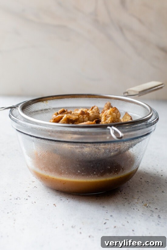 Make-Ahead Low-Carb Flourless Turkey Gravy 6 draining turkey stock