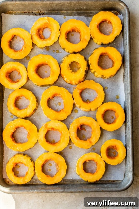 Oven-Roasted Delicata Squash Recipe 8 Place the delicata squash on a rimmed baking sheet with parchment.