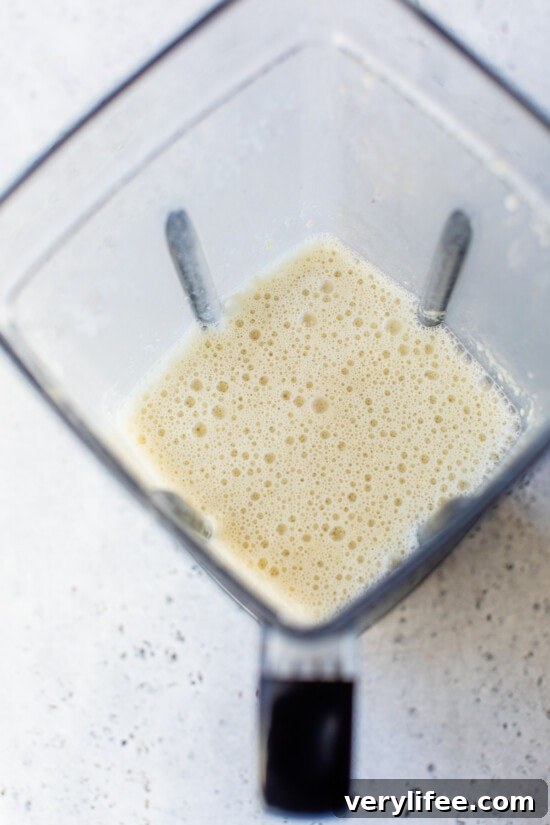 flour in blender with broth