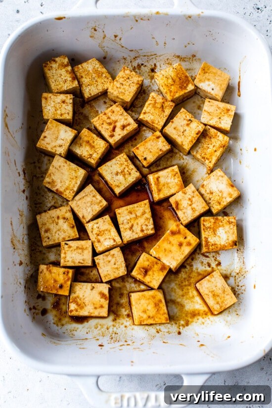 Crispy Air Fryer Peanut Curry Tofu with Ginger Cauliflower Rice 5 marinating tofu