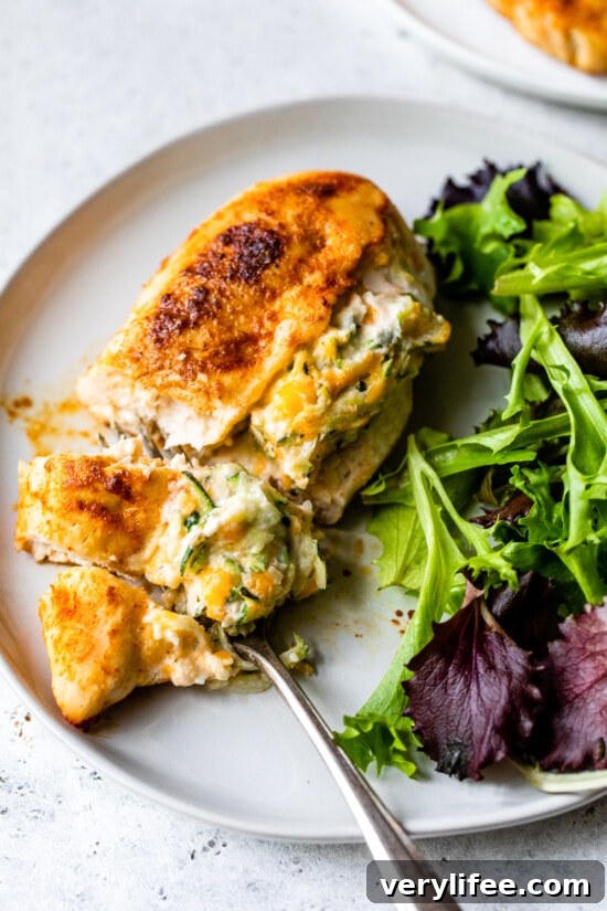 Cheesy stuffed chicken breasts with zucchini and creamy cheeses.