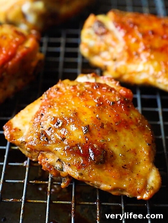 Crispy baked chicken thighs with a golden, crunchy skin.