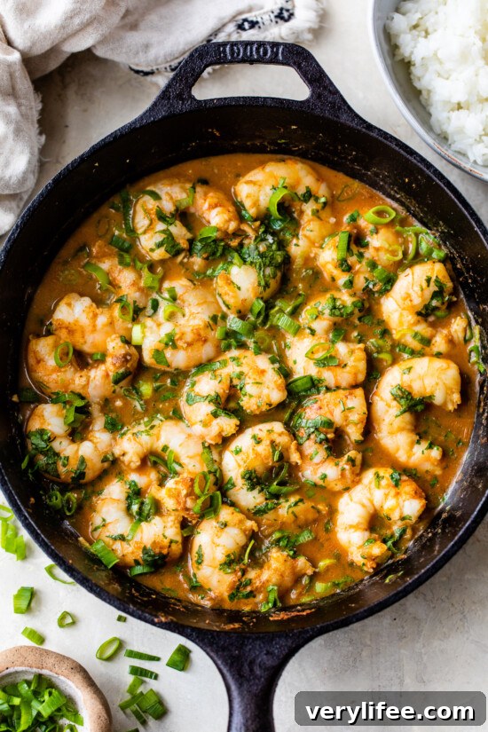 Red Thai coconut curry shrimp served over cauliflower rice.