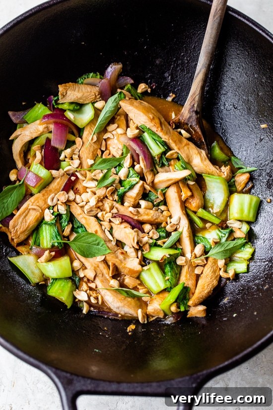 Garlic-ginger chicken stir-fry with bok choy and basil.