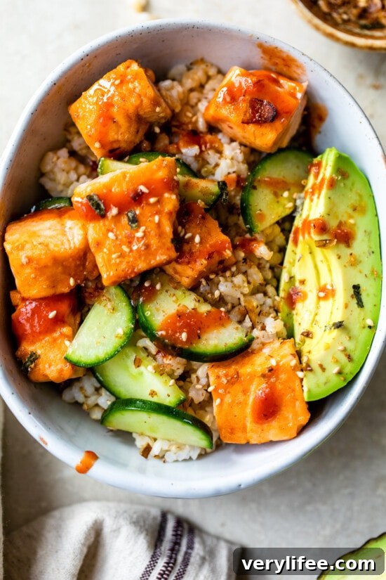Roasted Salmon Rice Bowls with avocado and cucumber