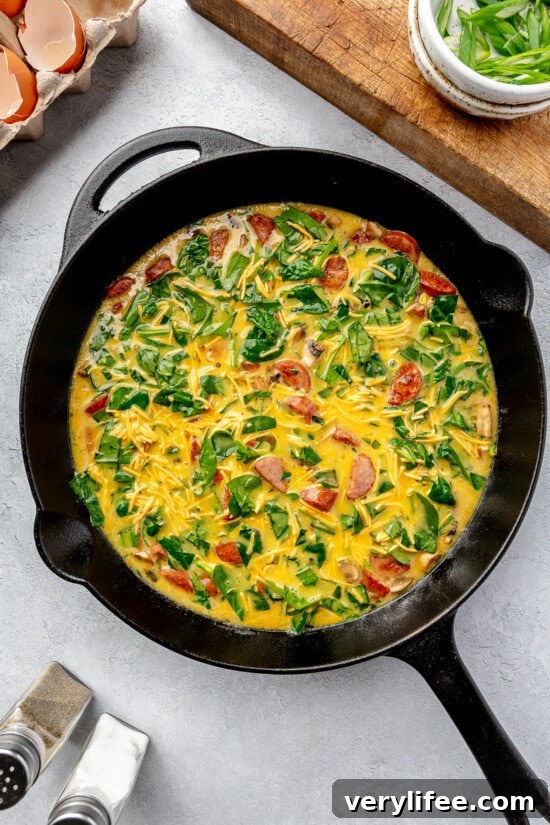 Smoked Turkey Sausage Breakfast Skillet with Eggs and Potatoes 8 Overhead view of a sausage frittata in a skillet.