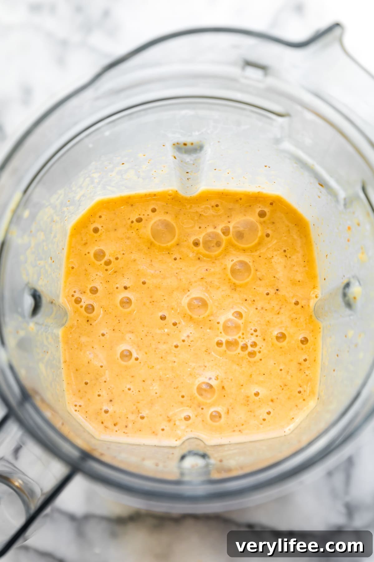 Carrot and Banana Protein Smoothie for Post Workout Recovery 6 Carrots, Bananas, protein powder, flax and almond milk