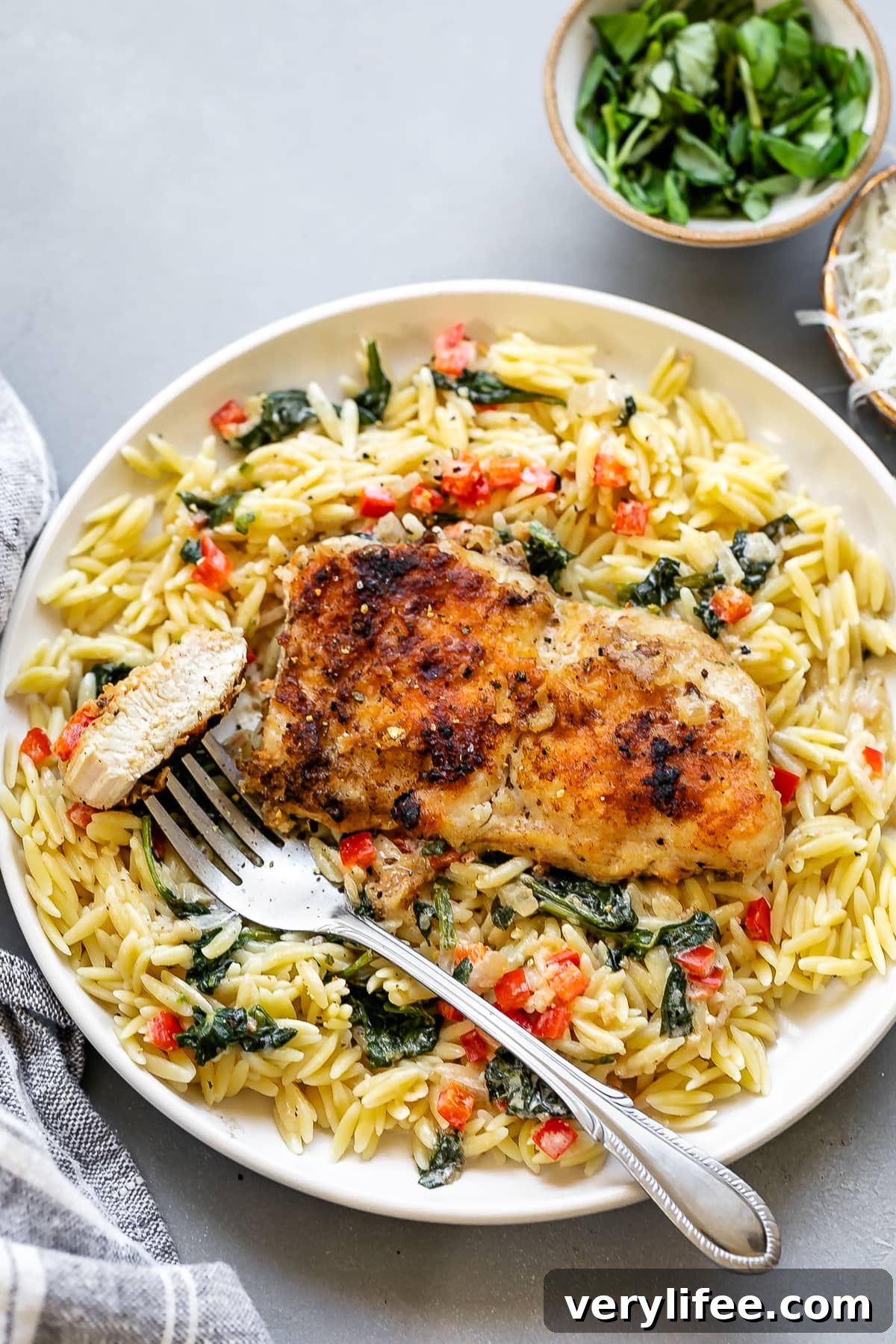 Chicken Florentine over orzo pasta