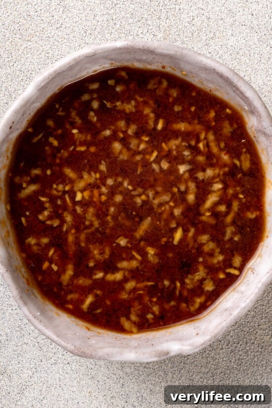 Stir fry sauce in a white bowl