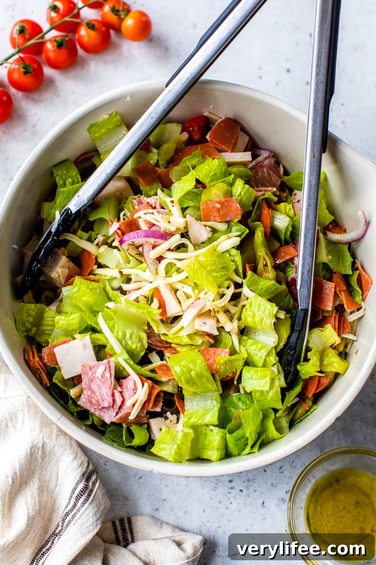 Italian Sub Salad with Salami, Provolone & Pepperoncini 7 tossing Italian salad