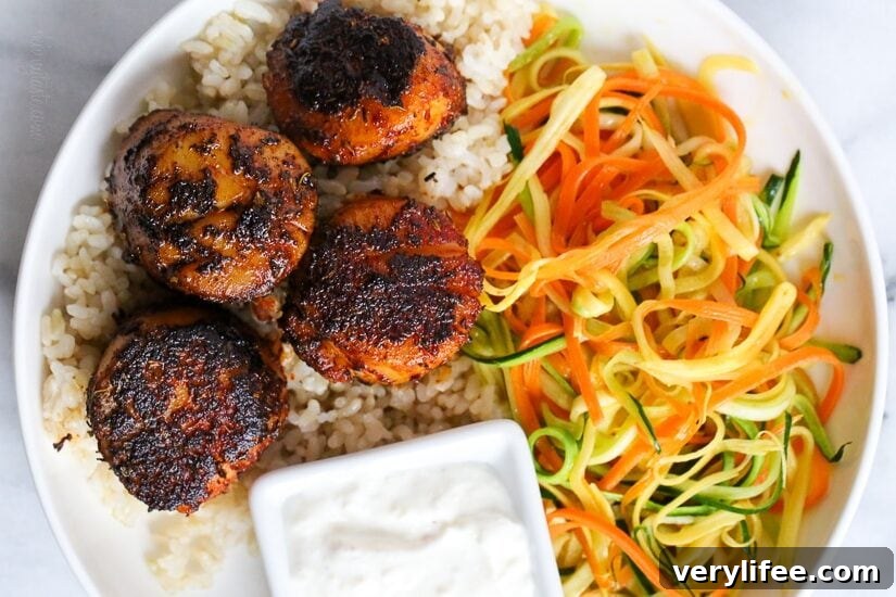 These quick seared Blackened Sea Scallops are coated in a homemade blend of blackened seasoning, then cooked in a cast iron skillet served with a creamy horseradish sauce.