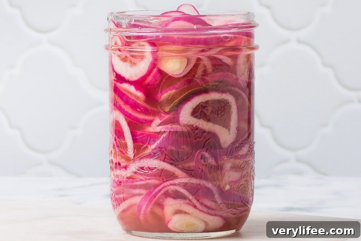 4 Mandoline Slicers Reviewed for 2024 9 red onions in mason jar