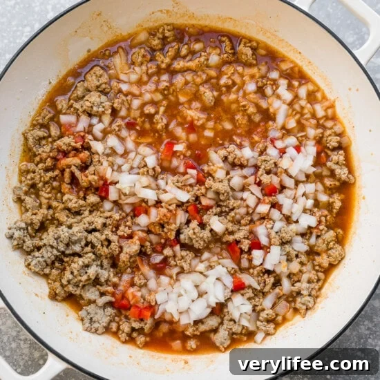 Savory Ground Turkey Tacos with Avocado Crema 6 Add seasoning, onions, bell pepper and tomato sauce
