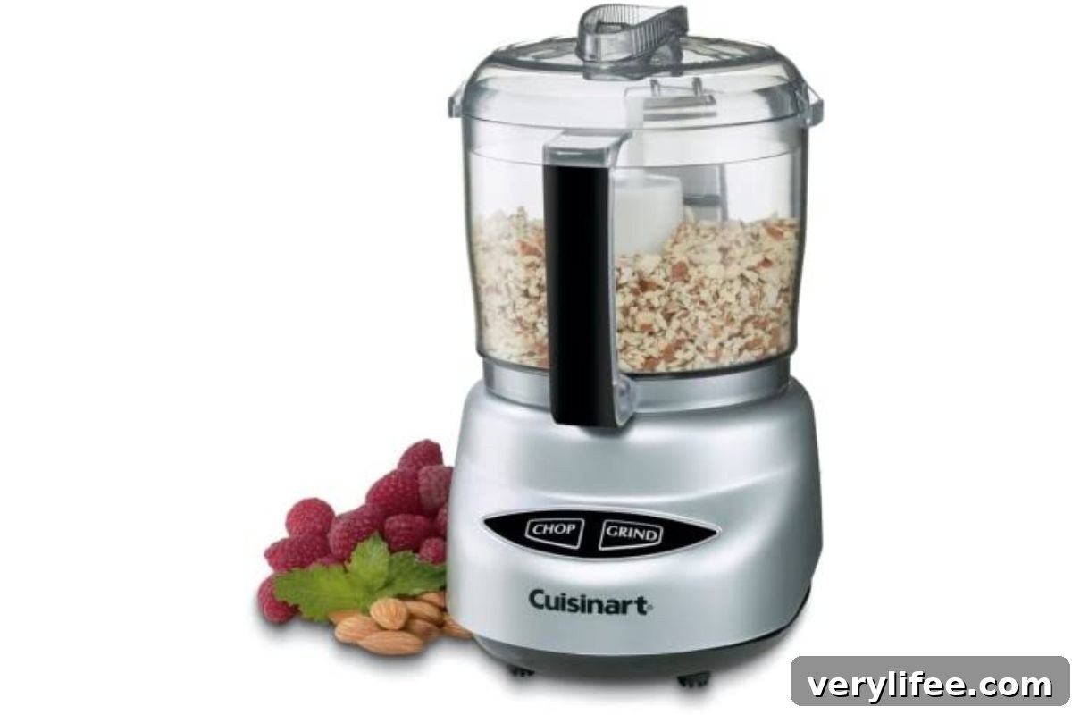 Cuisinart mini food processor on white background