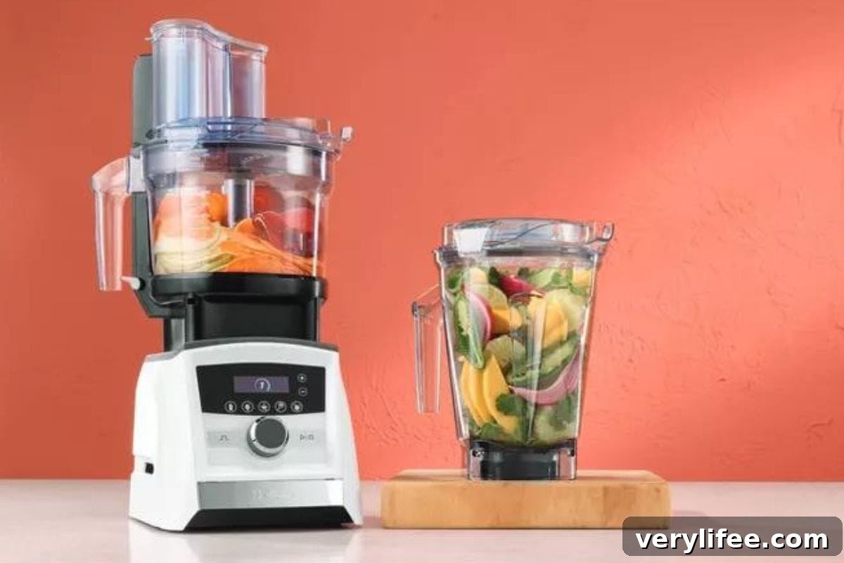 Vitamix A3500 SmartPrep Kitchen System on orange background