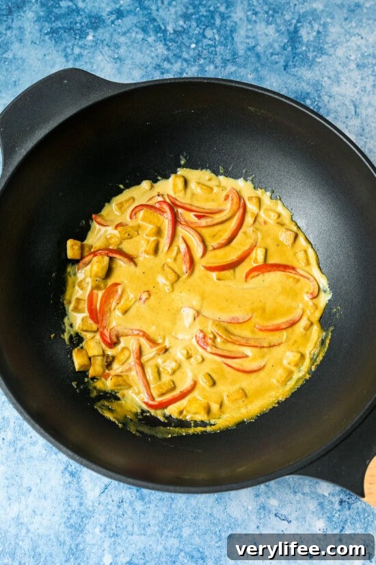 add bell peppers to coconut milk