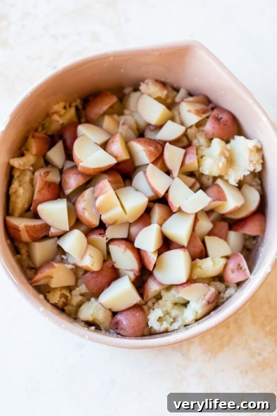 Creamy Green Goddess Potato Salad with Fresh Herbs 5 boiled red potatoes in a bowl