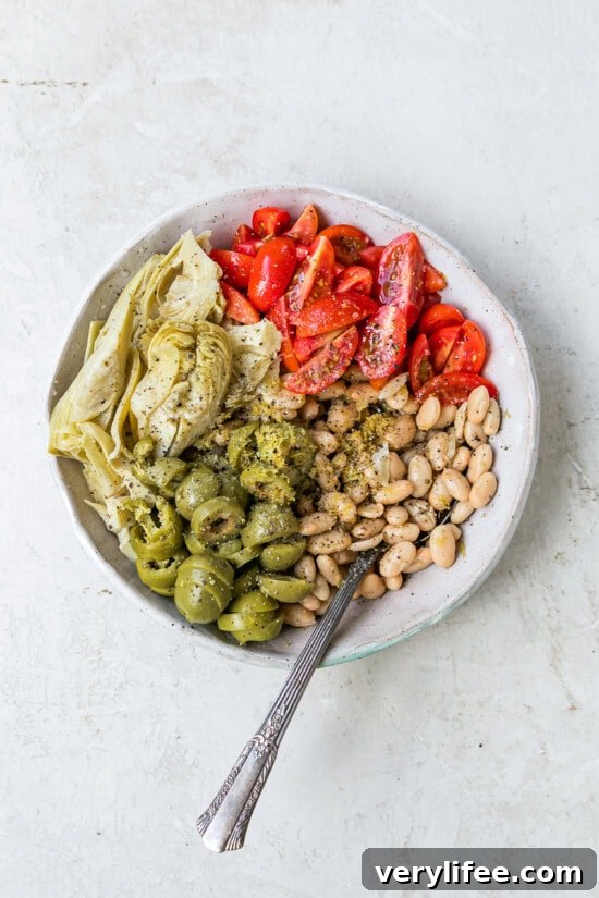 Parchment-Baked Fish: How to Cook En Papillote 6 beans, tomatoes, olives and artichoke hearts