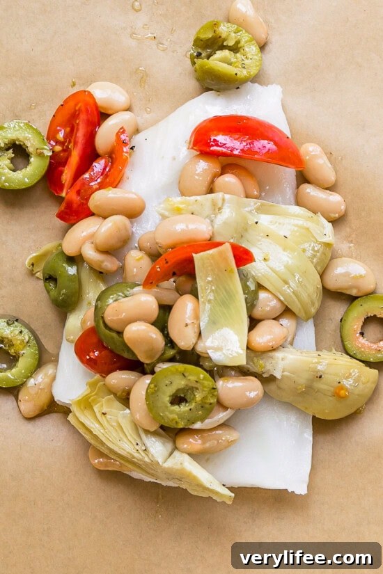 Parchment-Baked Fish: How to Cook En Papillote 7 fish on parchment topped with bean salad