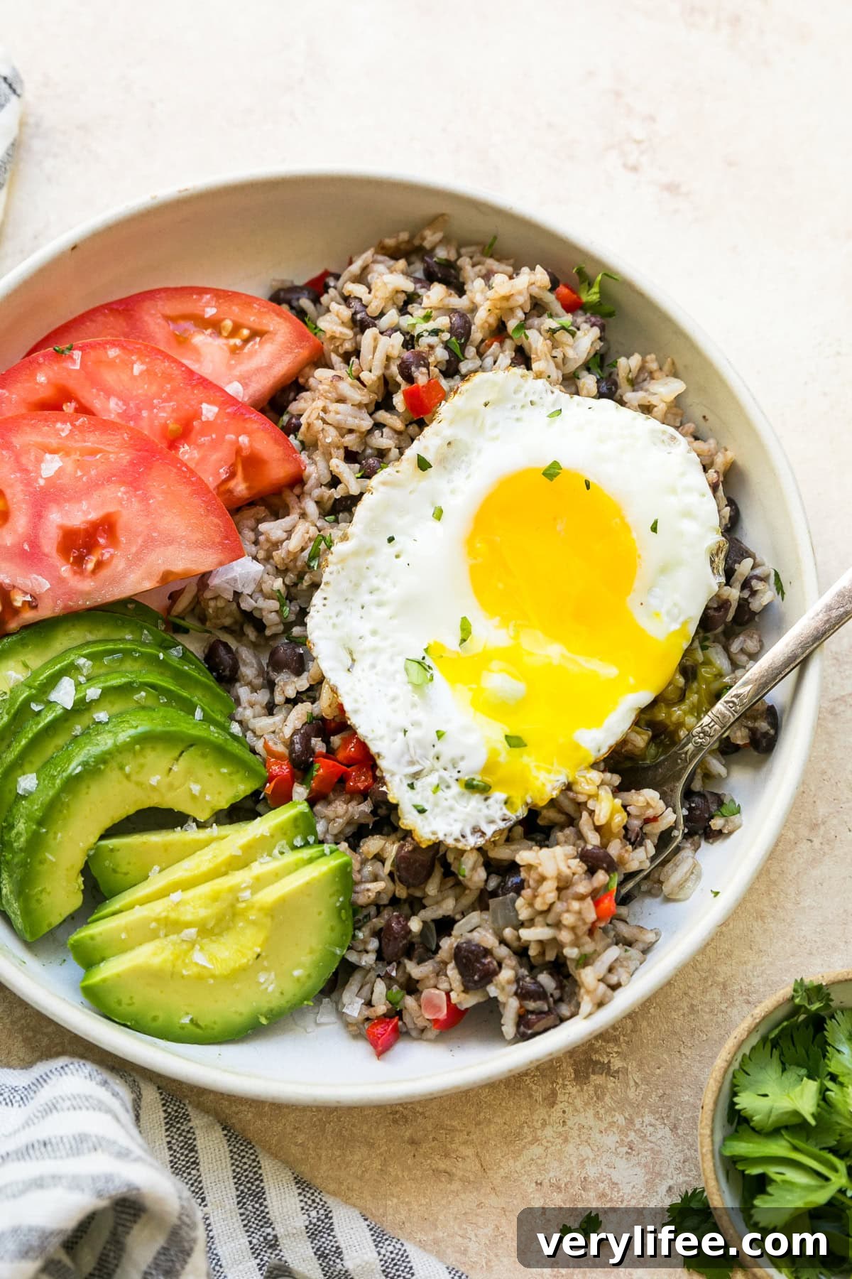 Gallo Pinto: Costa Rican Rice and Beans Recipe 11 Gallo Pinto with eggs, tomato and avocado.