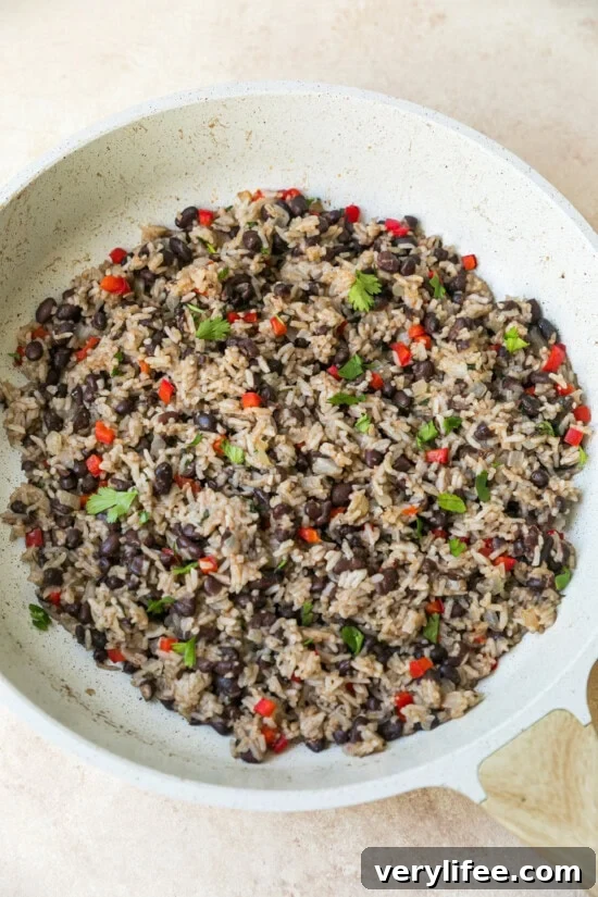 Gallo Pinto: Costa Rican Rice and Beans Recipe 9 Add the cooked rice.